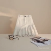 2026 Spring/Summer new half-length skirt: White denim irregular ruffled A-line skirt, high-waisted short skirt for women to prevent exposure. 100539358 Application Scenario